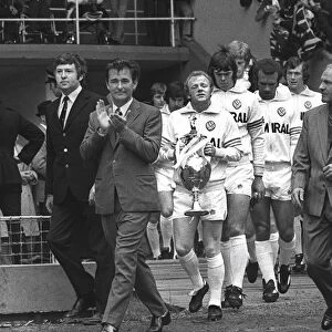 Leeds manager Brian Clough leads his side out for the 1974 Charity Shield