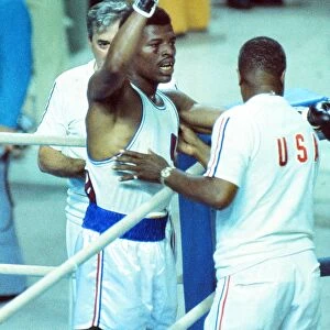 Leon Spinks celebrates his gold medal at the 1976 Montreal Olympics