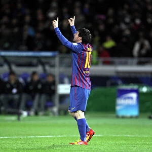 Lionel Messi celebrates scoring in the 2011 Club World Cup Final