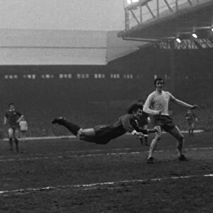 Liverpools Brian Hall puts in a diving header against Arsenal