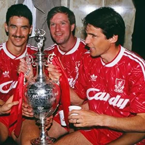 Liverpools Ian Rush, Ronnie Whelan and Alan Hansen celebrate winning the league in 1990