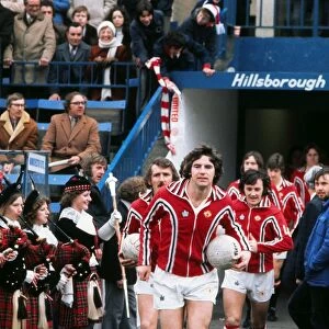 Martin Buchan leads out Manchester United in the 1976 FA Cup semi-final