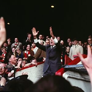 Matt Busby says farewell to the Old Trafford fans after his last home game as Manchester United manager