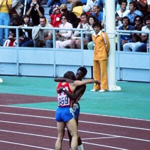 Mike Shine (silver) and Ed Moses (gold) congratulate each other after the mens 400m hurdles final at the 1976 Montreal Olympics