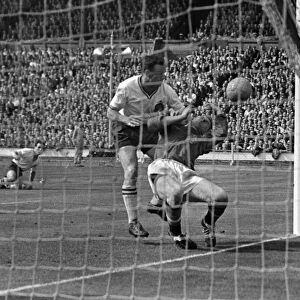 Nat Lofthouse controversially collides with goalkeeper Harry Gregg for his second goal in the 1958 FA Cup Final