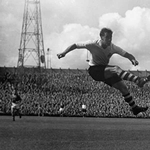 Nat Lofthouse scores against Leeds United in 1958