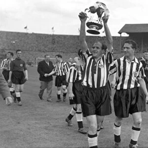 Newcastle captain Jimmy Scoular parades the trophy - 1955 FA Cup Final