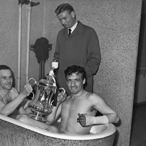Newcastle Uniteds Ron Batty and Ronnie Simpson celebrate winning the 1955 FA Cup