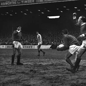 Nobby Stiles shakes a fist during the 1966 / 7 Manchester derby at Maine Road