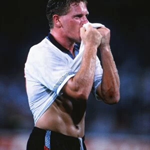 Paul Gascoigne kisses his shirt in celebration after victory over Cameroon at Italia 90