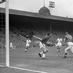 Peter McParland collides with Ray Wood during the 1957 FA Cup Final