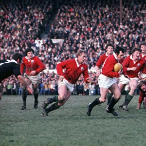 Phil Bennett runs with the ball during the 4th Test of the 1977 Lions Tour to New Zealand
