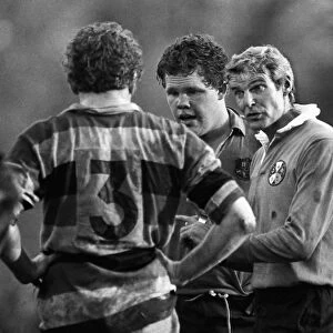 Referee Roger Quittenton talks to the forwards during Pontypools 1981 game with Australia