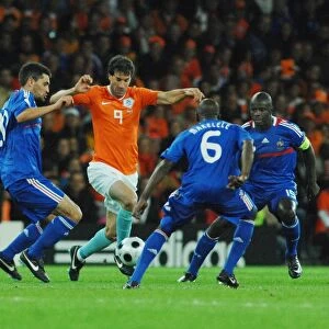 Ruud Van Nistelrooy takes on France during Euro 2008