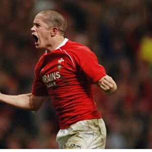 Shane Williams celebrates scoring against France in the 2008 Six Nations