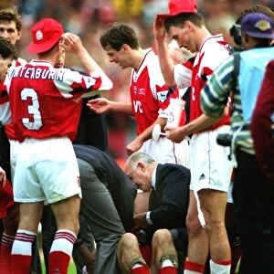 Steve Morrow lies injured after being dropped by Tony Adams during their 1993 League Cup celebrations
