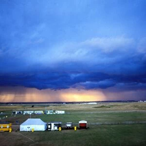 The sun bursts through the storm clouds at the 1985 Open Championship