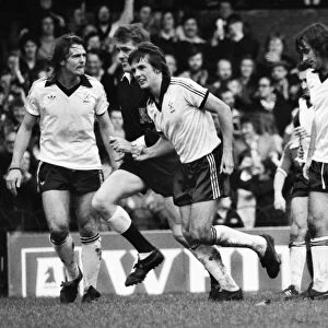 Terry Bullivant celebrates a goal for Fulham with George Best