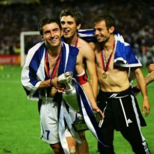Theodoros Zagorakis and his Greece team celebrate winning Euro 2004