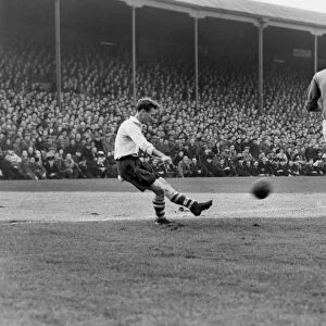 Tom Finney crosses the ball against Leeds United in 1950