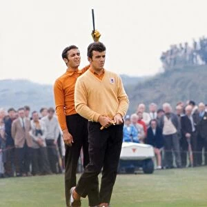 Tony Jacklin and Peter Townsend line up a putt at the 1969 Ryder Cup