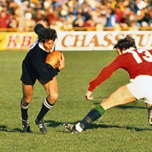 Wayne Smith makes a break for the All Blacks against the Lions in 1983