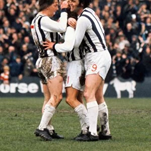 West Broms Colin Suggett and Jeff Astle celebrate with goalscorer Asa Hartford