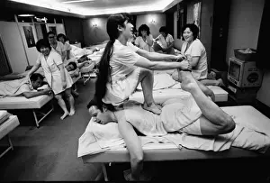 The 1972 Great Britain Olympic luge team relax in a bathouse in Sapporo, Japan