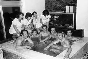 The 1972 Great Britain Olympic luge team relax in a bathouse in Sapporo, Japan