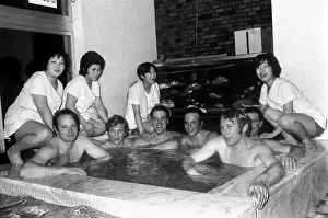 The 1972 Great Britain Olympic luge team relax in a bathouse in Sapporo, Japan