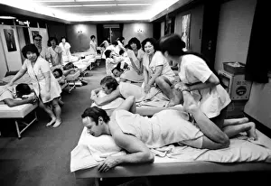 The 1972 Great Britain Olympic luge team relax in a bathouse in Sapporo, Japan