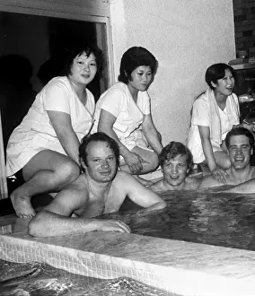 The 1972 Great Britain Olympic luge team relax in a bathouse in Sapporo, Japan