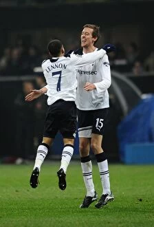 Images Dated 15th February 2011: Aaron Lennon congratulates Peter Crouch on his late goal against AC Milan in the 2010 / 11