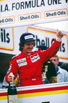Alain Prost celebrates winning his first world title in 1985
