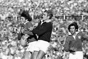 Images Dated 30th April 2009: Andy Irvine competes for the ball in the final test between the Lions and South Africa in 1974