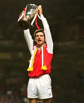 Arsenal goalscorer Alan Smith lifts the 1994 European Cup Winners Cup