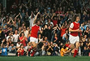 Images Dated 11th August 2010: Arsenals Brian Kidd celebrates a goal in front of the North Bank