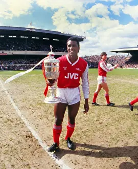 Arsenals David Rocastle celebrates with the Littlewoods Challenge Cup in 1987
