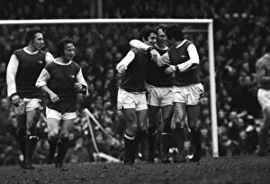 Images Dated 20th February 1971: Arsenals Frank McLintock celebrates his goal with Jon Sammels and Bob McNab