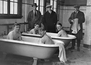 Aston Villa bathe in the changing rooms baths after a training session in 1923 / 4