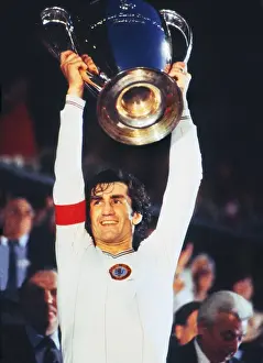 Aston Villa captain Dennis Mortimer lifts the European Cup