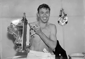 FA Cup Winners Collection: Aston Villa captain Johnny Dixon with the FA Cup in 1957