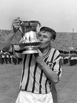 1957 FA Cup Final - Aston Villa 2 Manchester United 1 Prints: Aston Villa captain Johnny Dixon kisses the FA Cup in 1957
