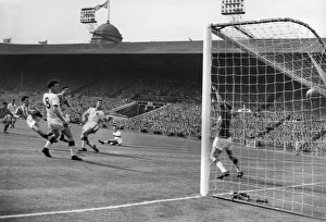 Aston Villas Peter McParland scores his second goal in the 1957 FA Cup Final