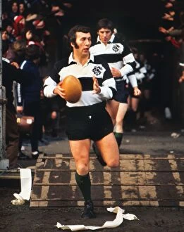 Images Dated 18th March 2011: Barbarians captain John Dawes runs out for famous 1973 game against the All Blacks