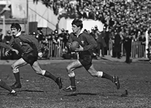 Barry John on the run with Gerald Davies in support - 1969 Five Nations