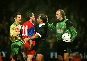 Bayerns Lothar Matthaeus and Norwich goalkeeper Bryan Gunn are separated at Carrow Road