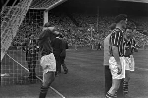1956 FA Cup Final - Manchester City 3 Birmingham City 1 Collection: Bert Trautmann holds his injured neck - 1956 FA Cup Final