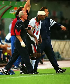 Images Dated 22nd June 2012: A bloodied Paul Ince during Englands famous draw with Italy in Rome in 1998