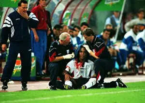Blood Prints: A bloodied Paul Ince during Englands famous draw with Italy in Rome in 1998